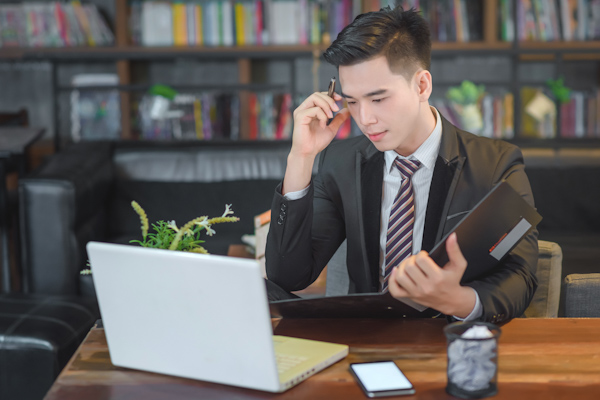 Young business man finds a solution on Yell.com